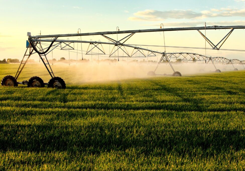Center pivot irrigation system watering crops.